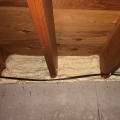 Image showing a polyurethane spray foam in the basement rim joist of a home.